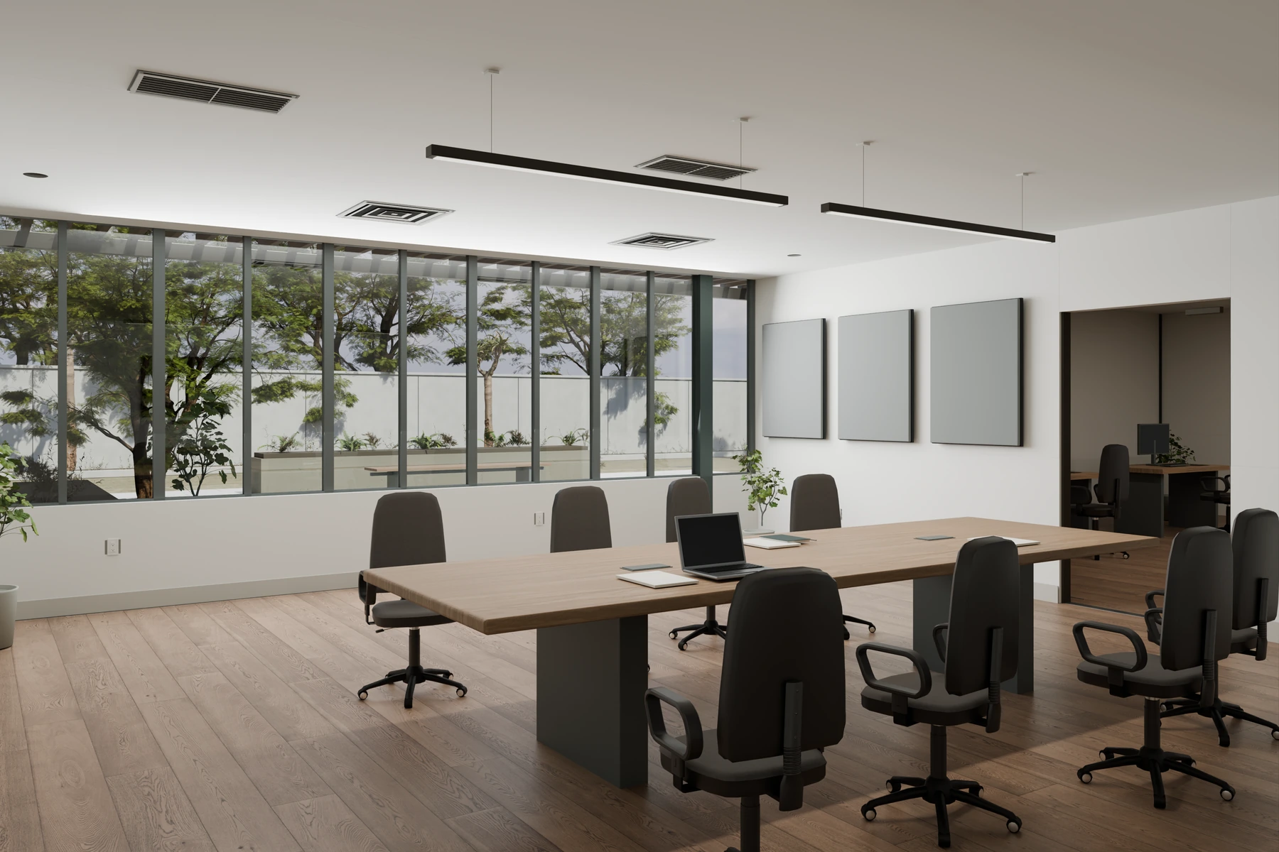 Finished courtyard office interior with a table, cabinetry, and daylight